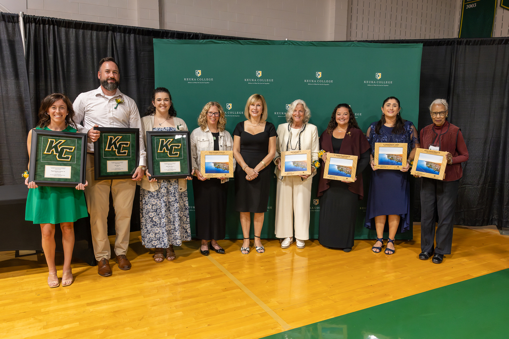President Amy Storey, center, is flanked by the College’s newest Hall of Fame inductees and Alumni Association Award winners, from left, Maggie Bonafede Gutierrez ’14, Matt Selden ’04, Paige Golden Judge ’14, Cindy Christopher Sechrist ’86, Heidi Nightengale ’83, Dr. Elizabeth “Liz” Mance Duxbury ’03, Dr. Victoria Syracusa ’19 M’20, and Barbara Johnson Williams ’63.