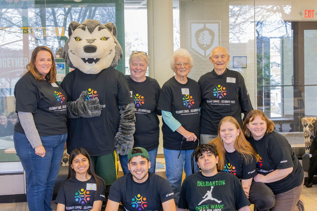 CSCY volunteers pose together with Keuka College's mascot Kacey