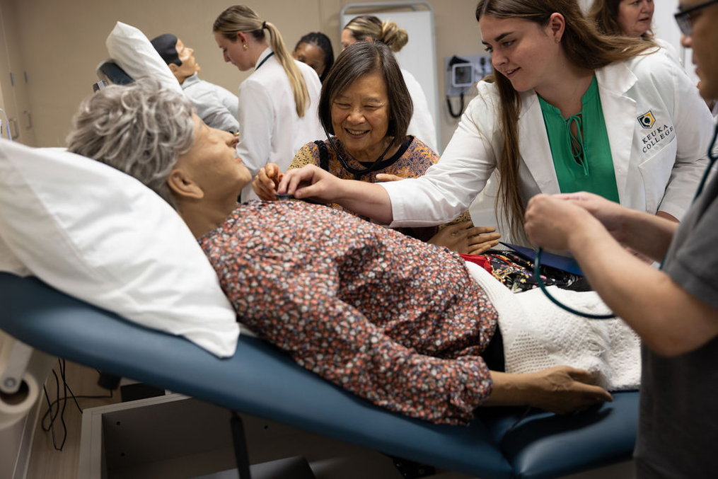 Janet Chin enjoys a demonstration of a new medium-fidelity manikin, named Mary, after her mother.