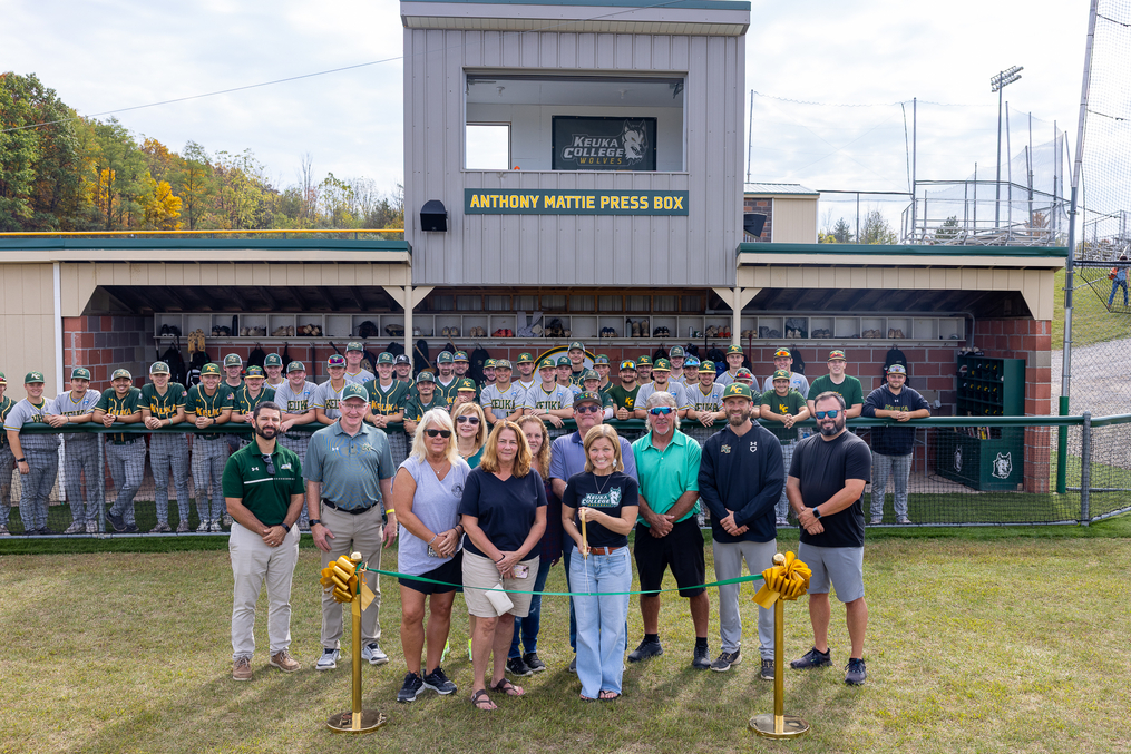 Family and friends of the late Anthony Mattie ’06 join College Department of Athletics officials during the dedication of a press box named in memory of Anthony.