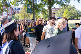 Flanked by applauding faculty and staff, Keuka College's newest students file into Norton Chapel to take part in the College's annual Academic Convocation.